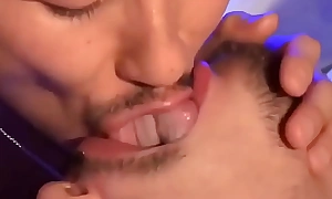 Three gay men tongue and spit giving a kiss (Lots of tongue)