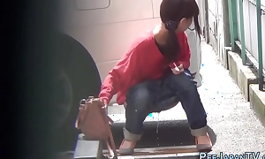 Japanese slut urinating in bring out street