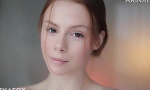 Awaiting Your Touch: Entrancing Redhead Anticipates Tantric Connection